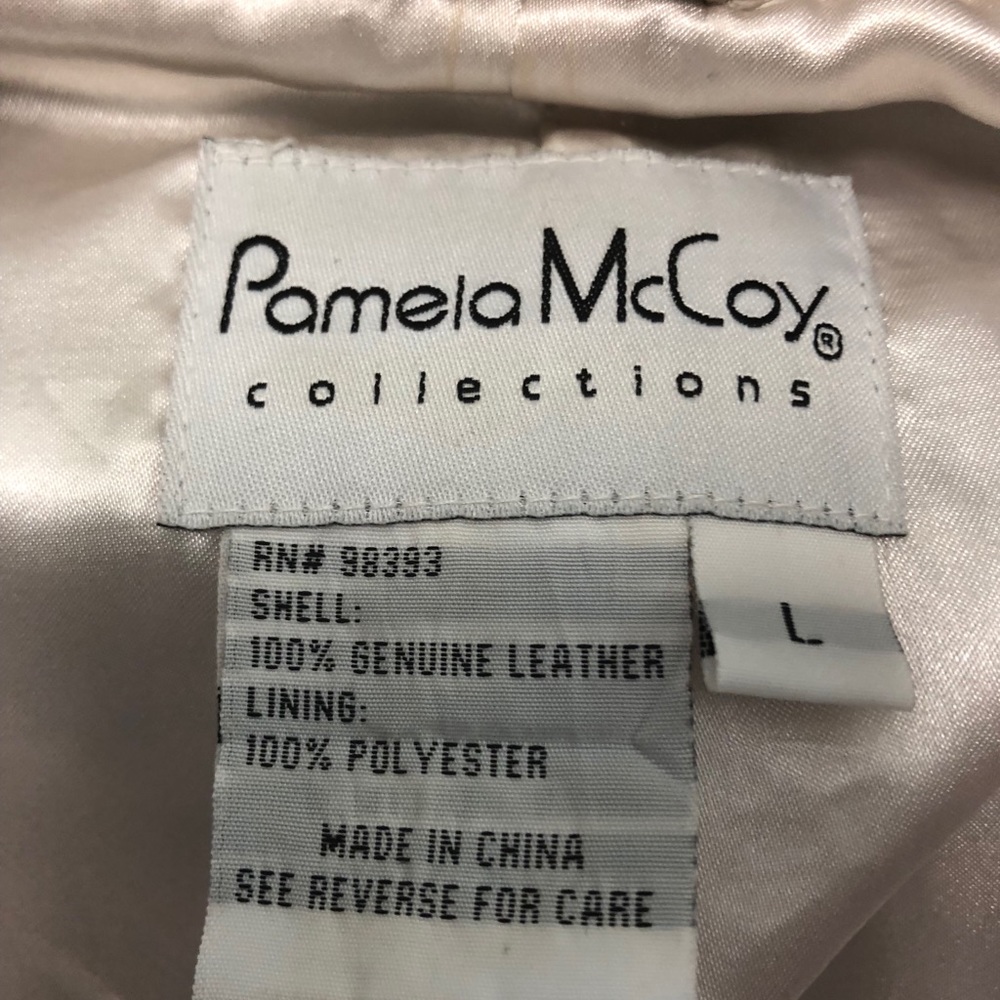 White leather jacket.
